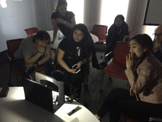 Students from the THAR130 course reviewing one of the final 3D printed set designs